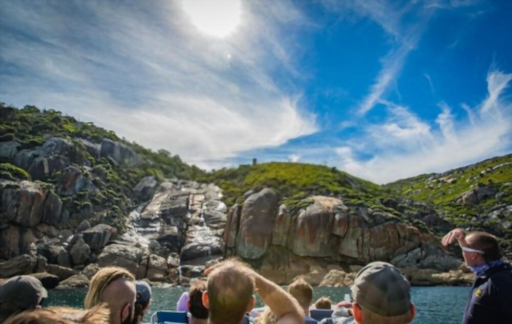 A group of people on a boat
Description automatically generated with medium confidence